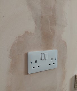 new socket installed on fresh plaster during house rewire in Spennymoor