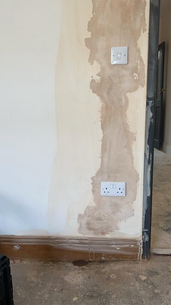 new sockets and switches installed on fresh plaster during a house rewire in County Durham
